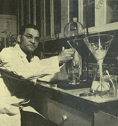 Harold Evans in a lab